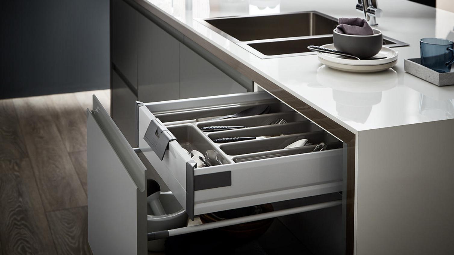 Internal storage drawer with cutlery tray