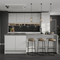 Modern gloss grey kitchen with cotemporary accessories including black kitchen tap and dark grey walls and pendant lighting.