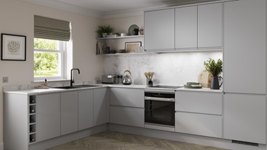 A gloss, dove grey kitchen, in an L-shaped layout. The kitchen has wall-mounted cabinets, wine rack, and oak flooring.