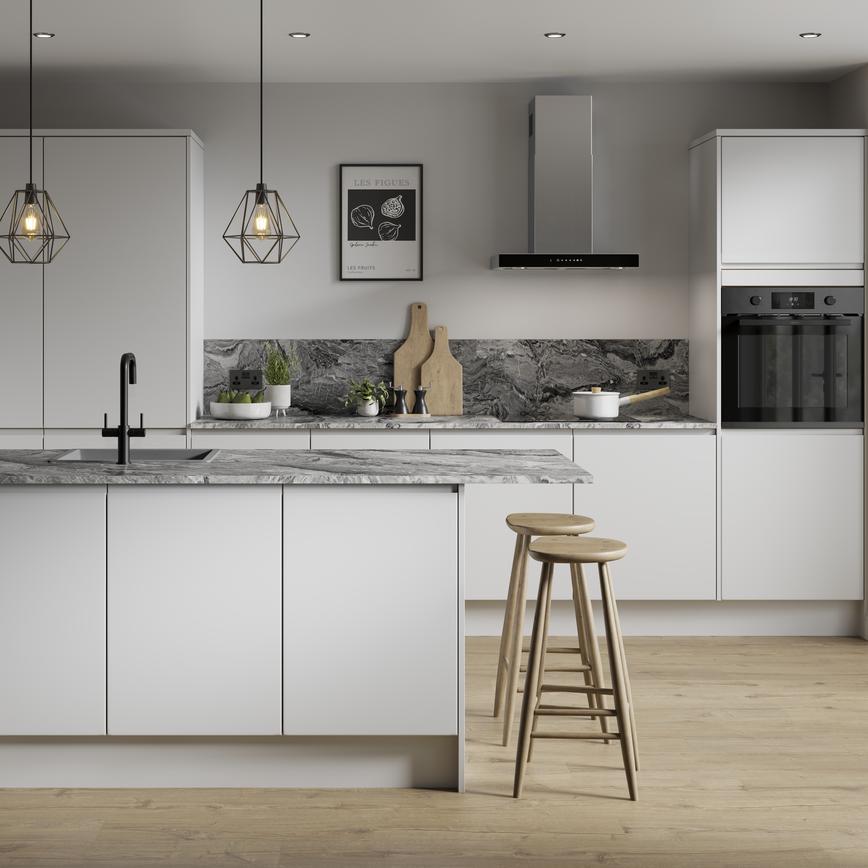 Modern dove grey kitchen with matt finish in an island layout. Includes dark grey counters and oak floors for a Scandi-style.