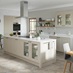Pebble grey shaker kitchen with inset units incorporating a double oven. Kitchen island with cabinet storage.