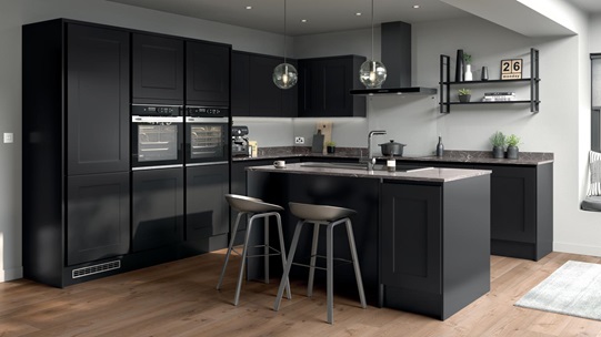 L-shape kitchen with black shaker doors, grey marble worktops, timber floors, and matt-black trims for a handleless look