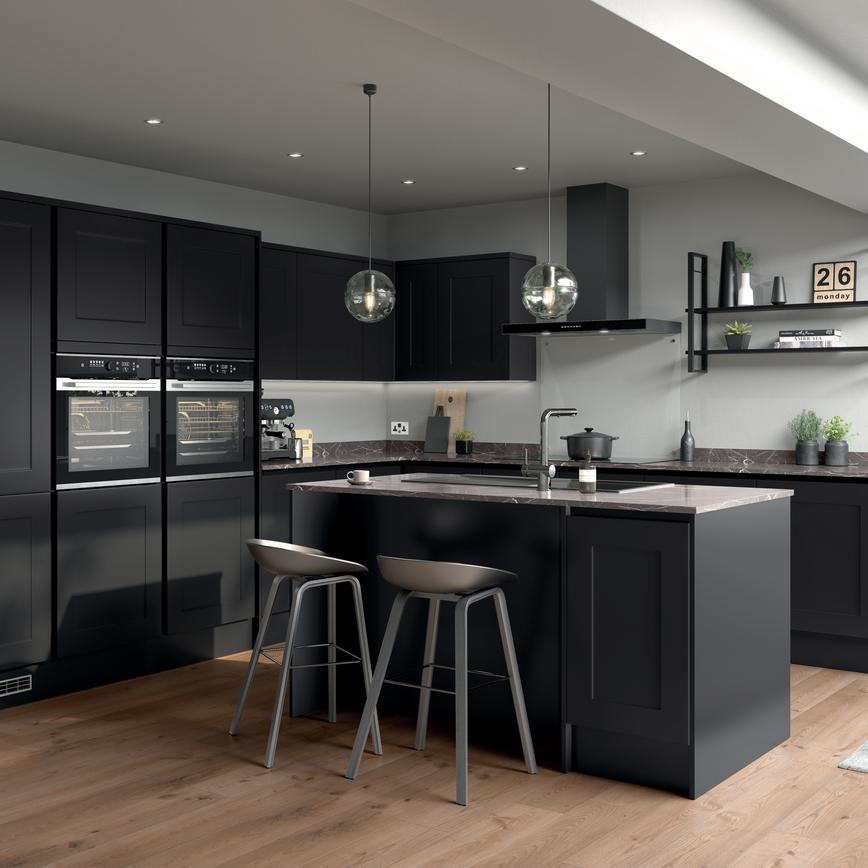 L-shape kitchen with black shaker doors, grey marble worktops, timber floors, and matt-black trims for a handleless look