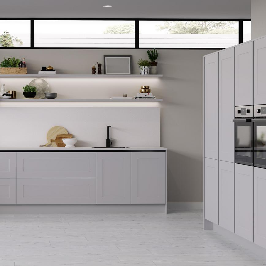 Ultra modern  handleless dove grey shaker kitchen with decorative black inlays and matching black kitchen mixer tap