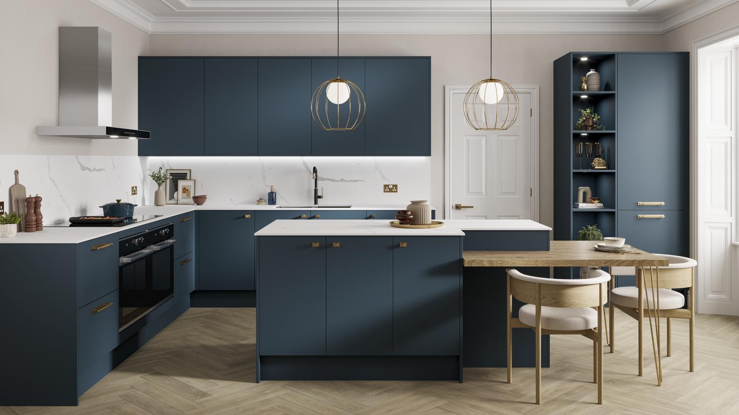Marine blue kitchen idea with slab doors in an island layout. Has white worktops, light chevron floors, and knob handles.
