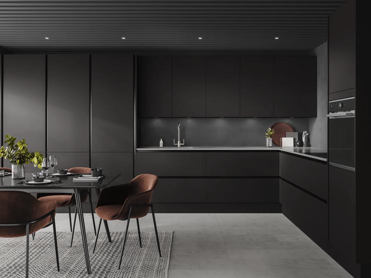 Handleless black kitchen idea using charcoal slab doors and black trims. Includes larders and drawers in a L-shaped layout.