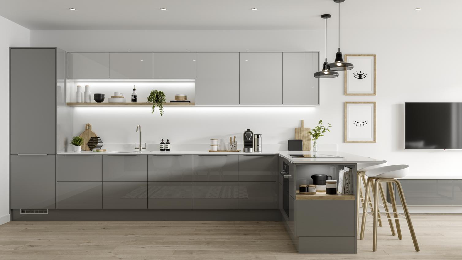 Slate grey l shaped handleless kitchen with half height and full height wall units and contrasting white kitchen worktop.