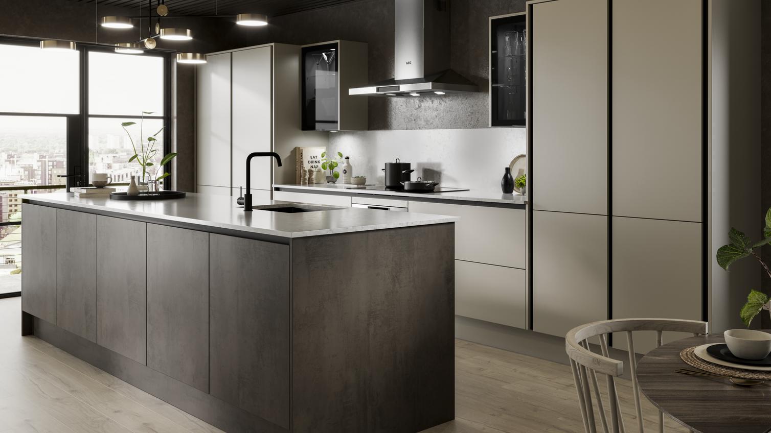 Two-tone handleless kitchen design in an island layout. Includes dark stone and cream slab cupboards and matt-black trims.
