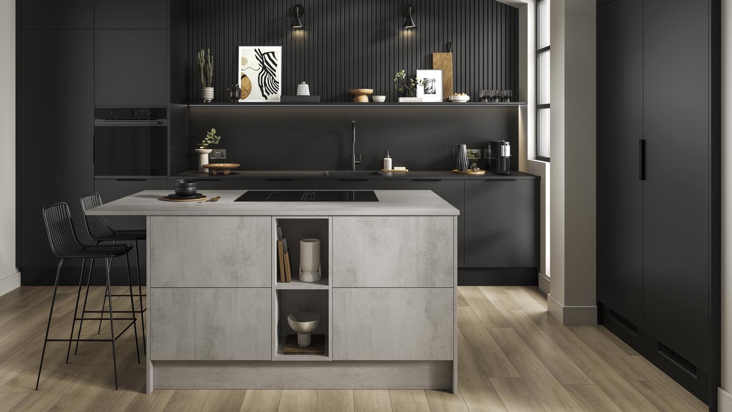 A matt black kitchen with a black worktop and appliances. Includes a grey, stone-effect kitchen island.