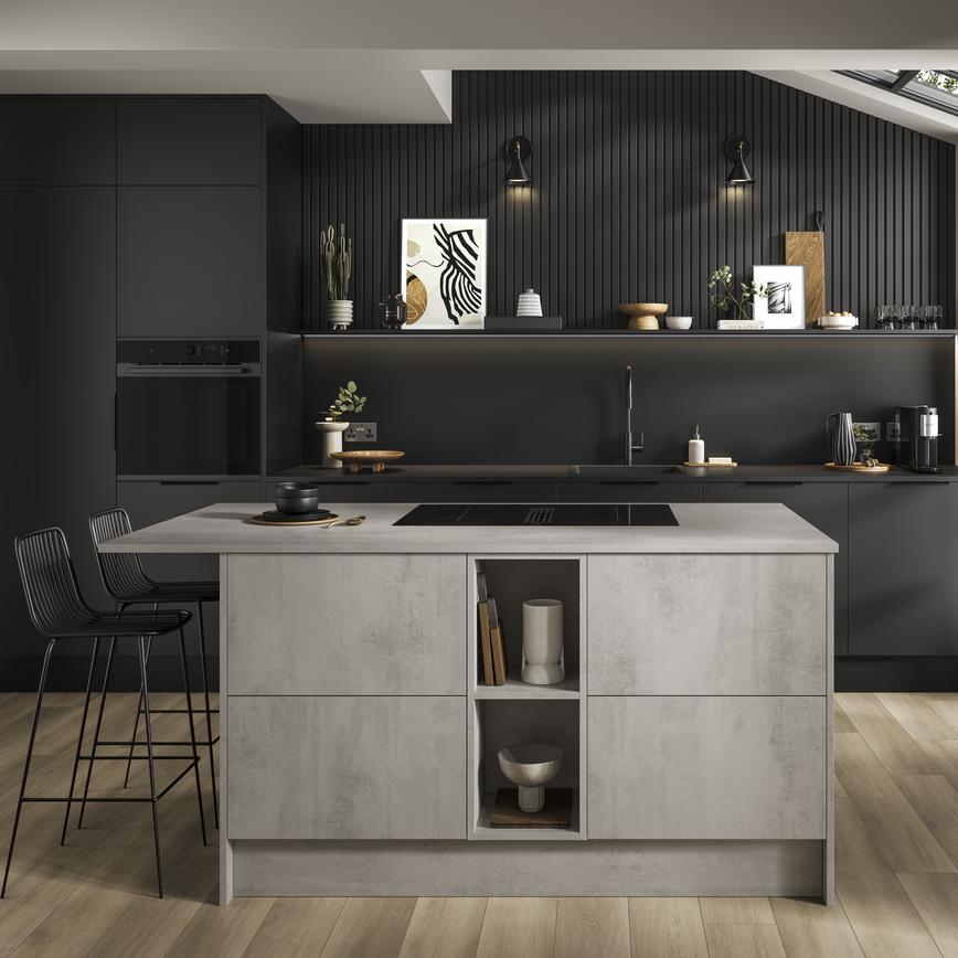 A matt black kitchen with a black worktop and appliances. Includes a grey, stone-effect kitchen island.