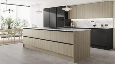 An industrial kitchen idea with oak and black slab doors in an island layout. Has black profiles and white, quartz worktops.