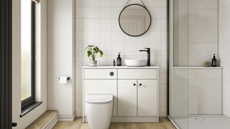 A porcelain, slab kitchen in a single wall layout. There are white worktops, plank flooring, and a black tap.