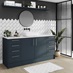 Nautical bathroom idea with marine-blue slab cupboard doors and white worktops. Includes silver bar handles and oak flooring.