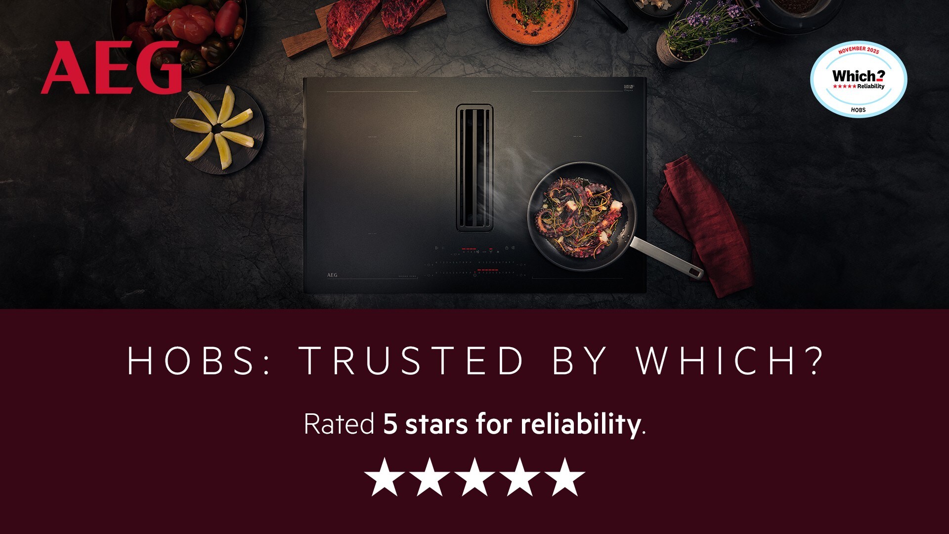 A Which? logo and AEG logo on a black extractor hob set on a black worktop with the words hobs trusted by which