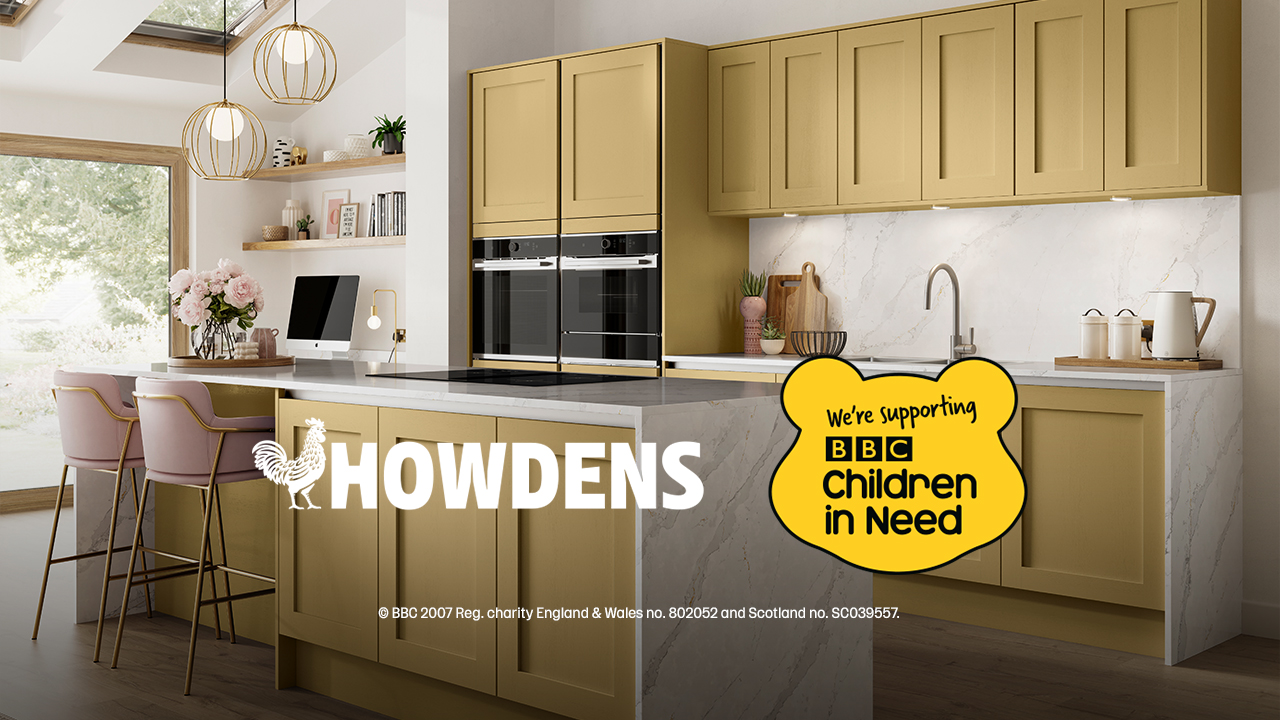 Children in Need charity banner featuring a handleless Howdens paintable shaker kitchen