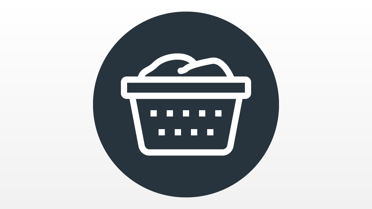 Laundry buying guide icon showing a white outline of a full washing basket on a black circle.
