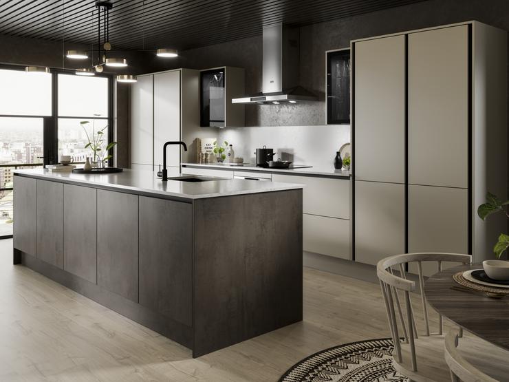 A sandstone kitchen with a textured, dark stone kitchen island