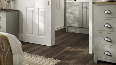 DIC0970 Colonial white door with dark wood effect flooring