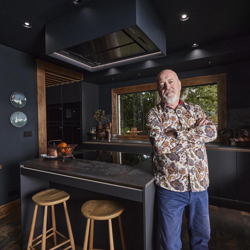 Bill stood in his kitchen