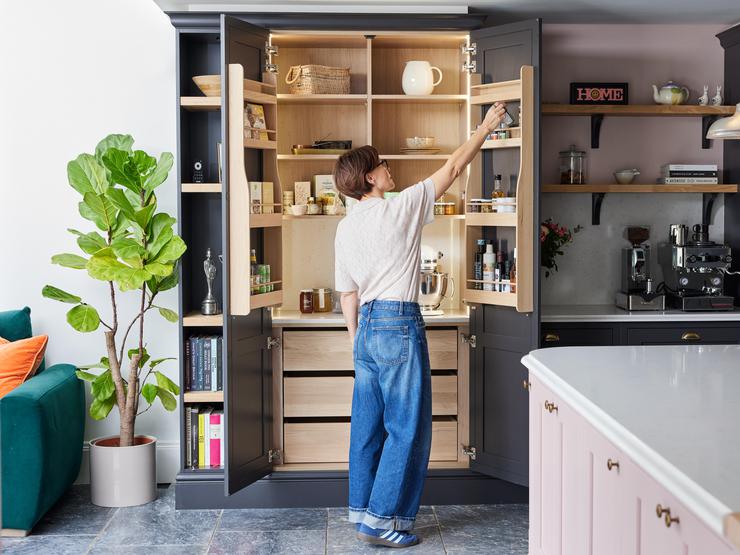 Emma examining her new timber larder