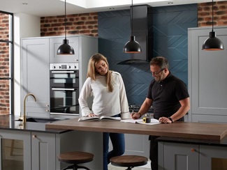 Customer and builder looking at plans