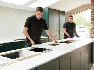 Ping Coombes worktops fitting 54