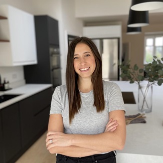 Influencer Sarah Evens standing in Clerkenwell kitchen