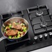 AEG HHKB64420NB 60cm Black Gas Hob In Use Food Is Cooking