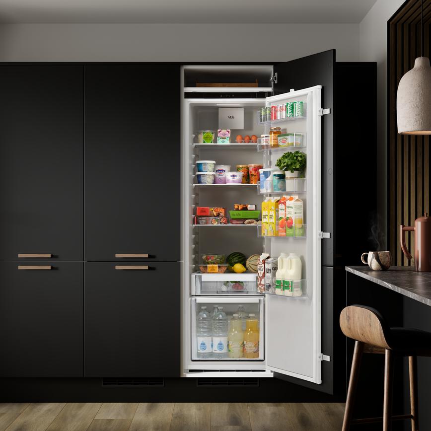 Integrated White Fridge Fridge Open Featuring Hockley Black