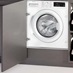 Neff W543BX2GB Integrated 8Kg 1400rpm White Washing Machine in a Laundry Room