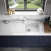 Single Bowl White Composite Sink With Stainless Steel Waste Kit, Senna Chrome Tap in a Chelford Navy Kitchen