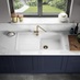 Single Bowl White Composite Sink With Brass Waste Kit, Senna Brass Tap in a Chelford Navy Kitchen