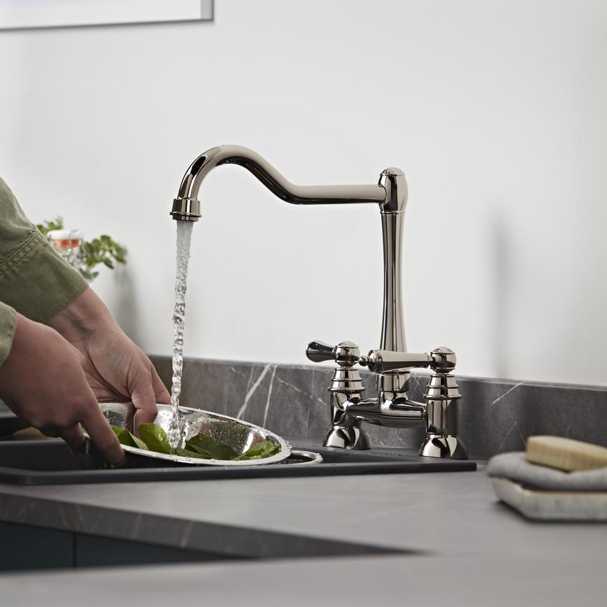 Polished Nickel J Spout Bridge Tap In Use