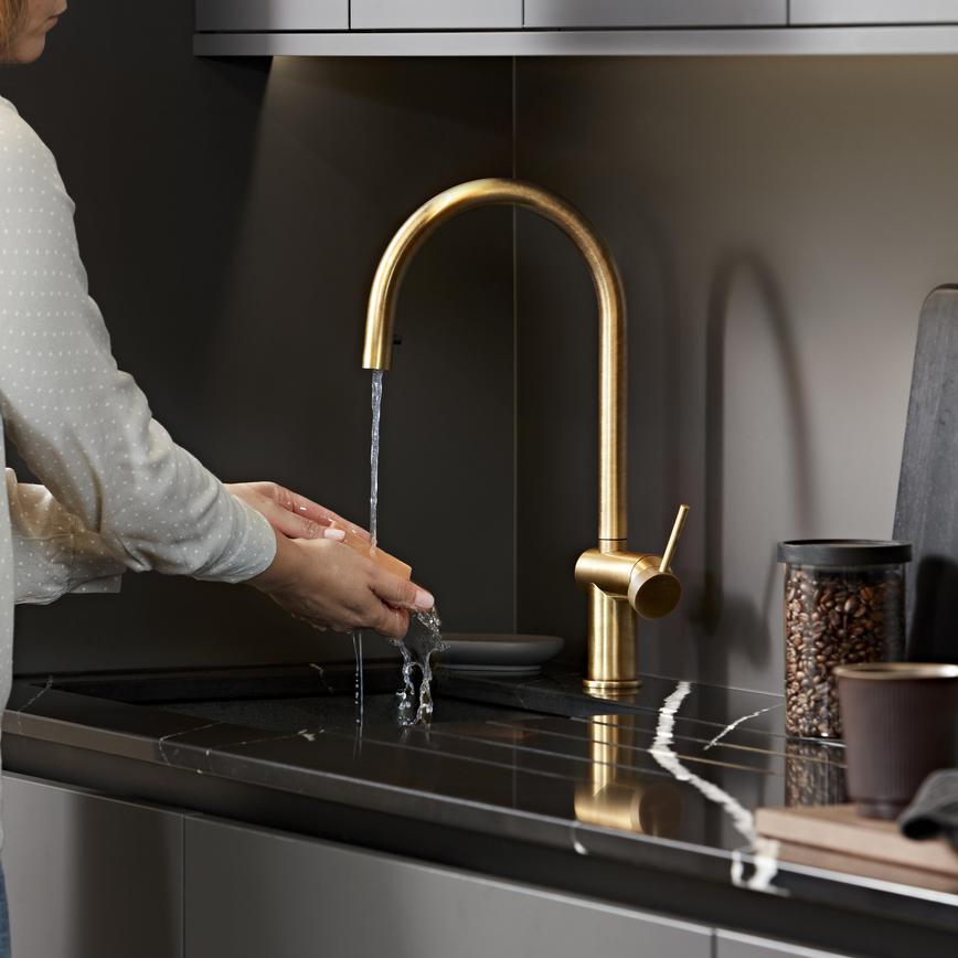 Porlock Brushed Aged Brass Swivel Pull Out Tap In Use