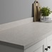 Lunar Stone Bullnose Worktop on White Shaker Cabinet with Black Knobs