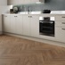 Howdens Professional V Groove Herringbone Natural Oak Laminate Flooring 0.87m² Pack