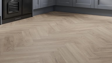 Howdens Herringbone Light Oak Laminate Flooring 1.238 m² Pack Featuring Fairford Dusk Blue