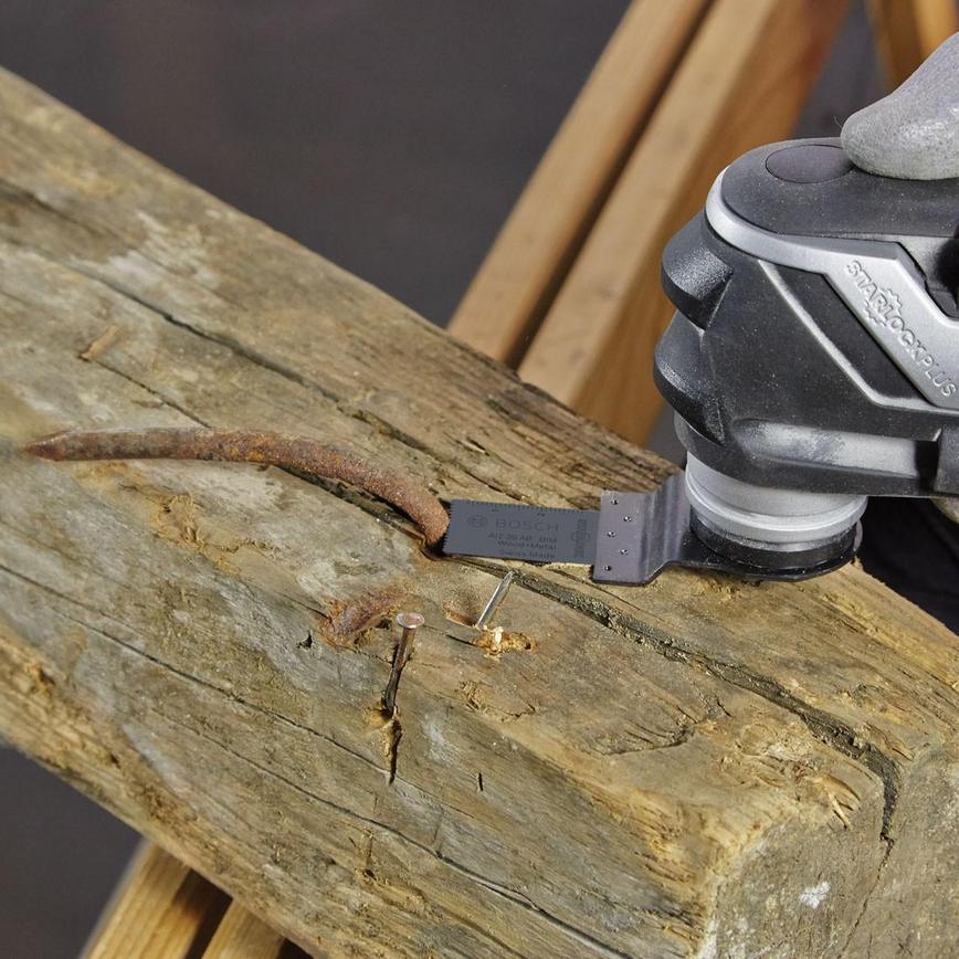 Starlock Multi Tool set being used on a block of wood