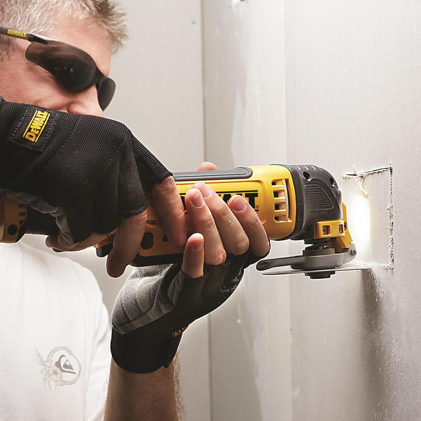 DeWalt DCS355 18V XR Oscillating Tool Cutting Plasterboard