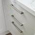 3 Bickern Brushed NickelCupboard Handles horizontally mounted on a set of drawers