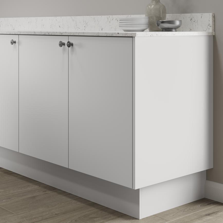 White 15mm MFC continuous plinth 2.75m fitted with base cabinet and white worktop