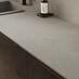 Winterton Gloss Sandstone And Dark Stone Worktop