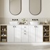 Bathroom with large, white shaker vanity units. It has black handle and tap accessories, with custom shelving to the side.