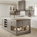 A mushroom brown shaker Ilfracombe kitchen island. It has matching base & tower units in porcelain, & oak-effect flooring.