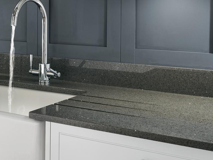 Grey mirror chip quartz worktop and upstand