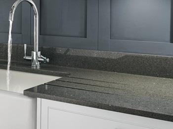 Grey mirror chip quartz worktop and upstand