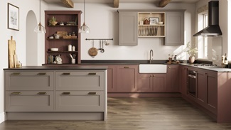 A red kitchen idea with shaker cupboards in a peninsula layout. Includes open shelving, a butler sink, and a black extractor.