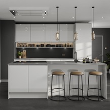 Modern gloss grey kitchen with cotemporary accessories including black kitchen tap and dark grey walls and pendant lighting.