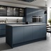 Contemporary marine blue kitchen in an island layout with a matt finish. Includes a grey worktop and black glass wall units.