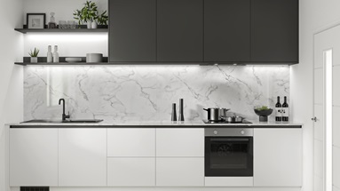 A classic monochrome black kitchen idea using white and charcoal slab cupboards, matt-black trims, and a marble backboard.